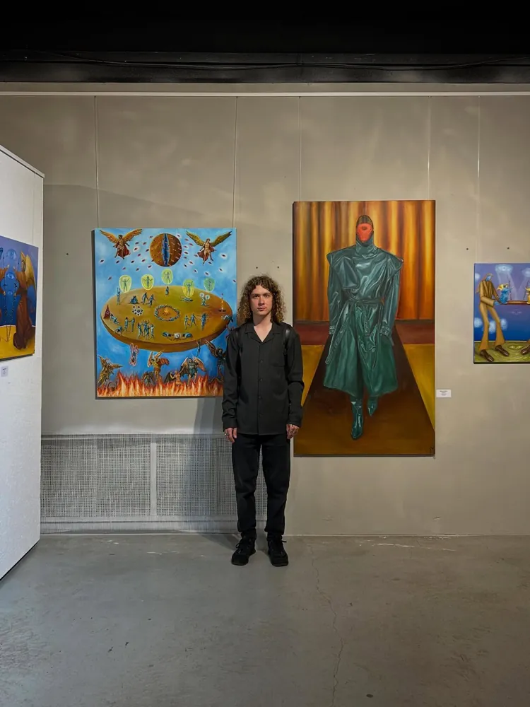 Valentyn Metyk with his paintings at A Gaze Through Reality, Lavra Gallery, Kyiv