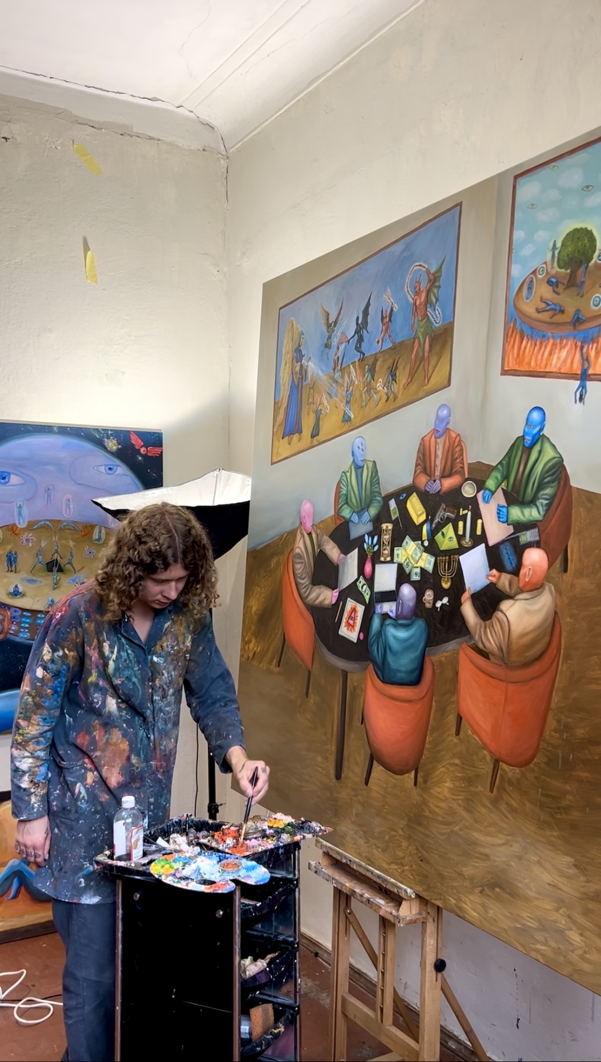 Valentyn Metyk painting in his studio